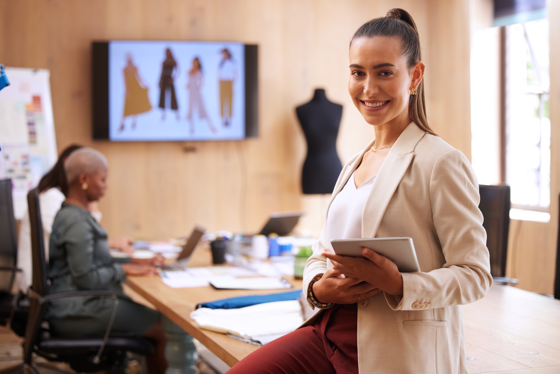 Shot of a young businesswoman using a digital tablet at work